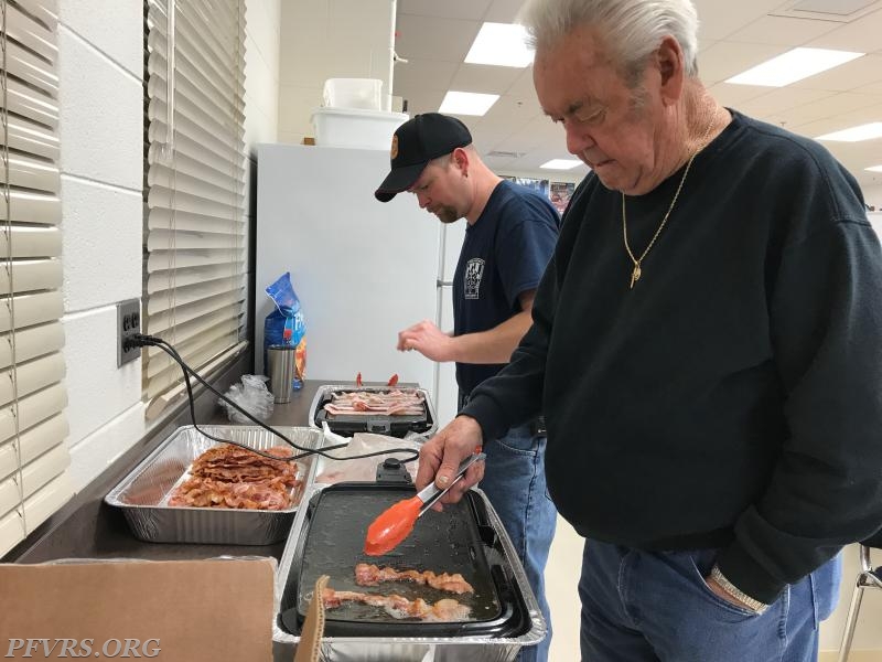 David and Sonny working the &quot;Bacon Station&quot;.